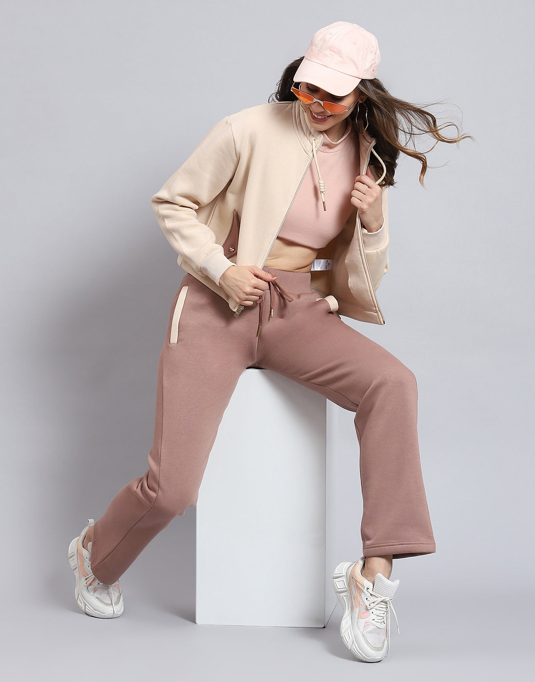 Buy Women Beige Solid Stand Collar Full Sleeve Tracksuit Online in