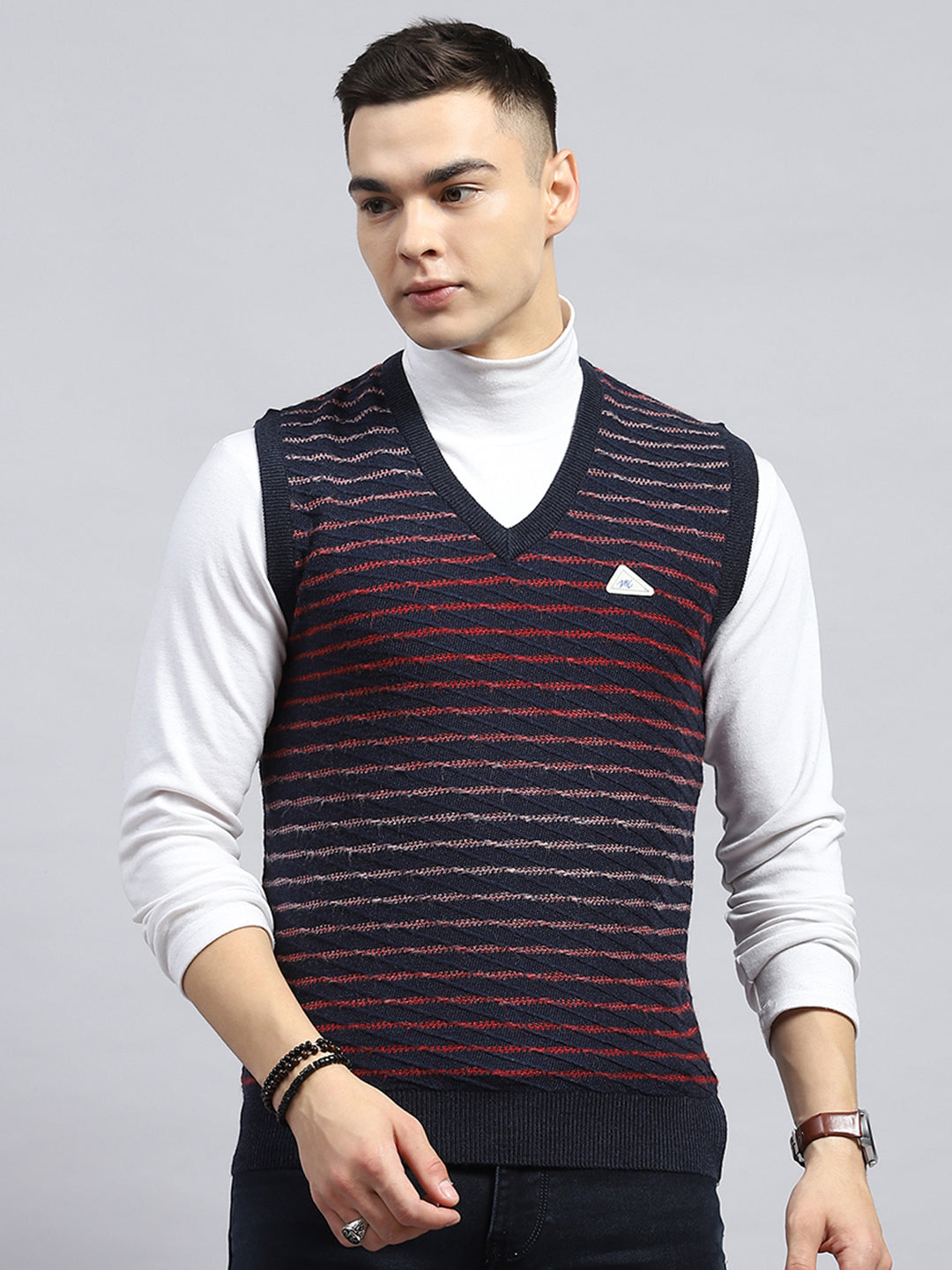 Men Navy Blue Self Design V Neck Sleeveless Sweater