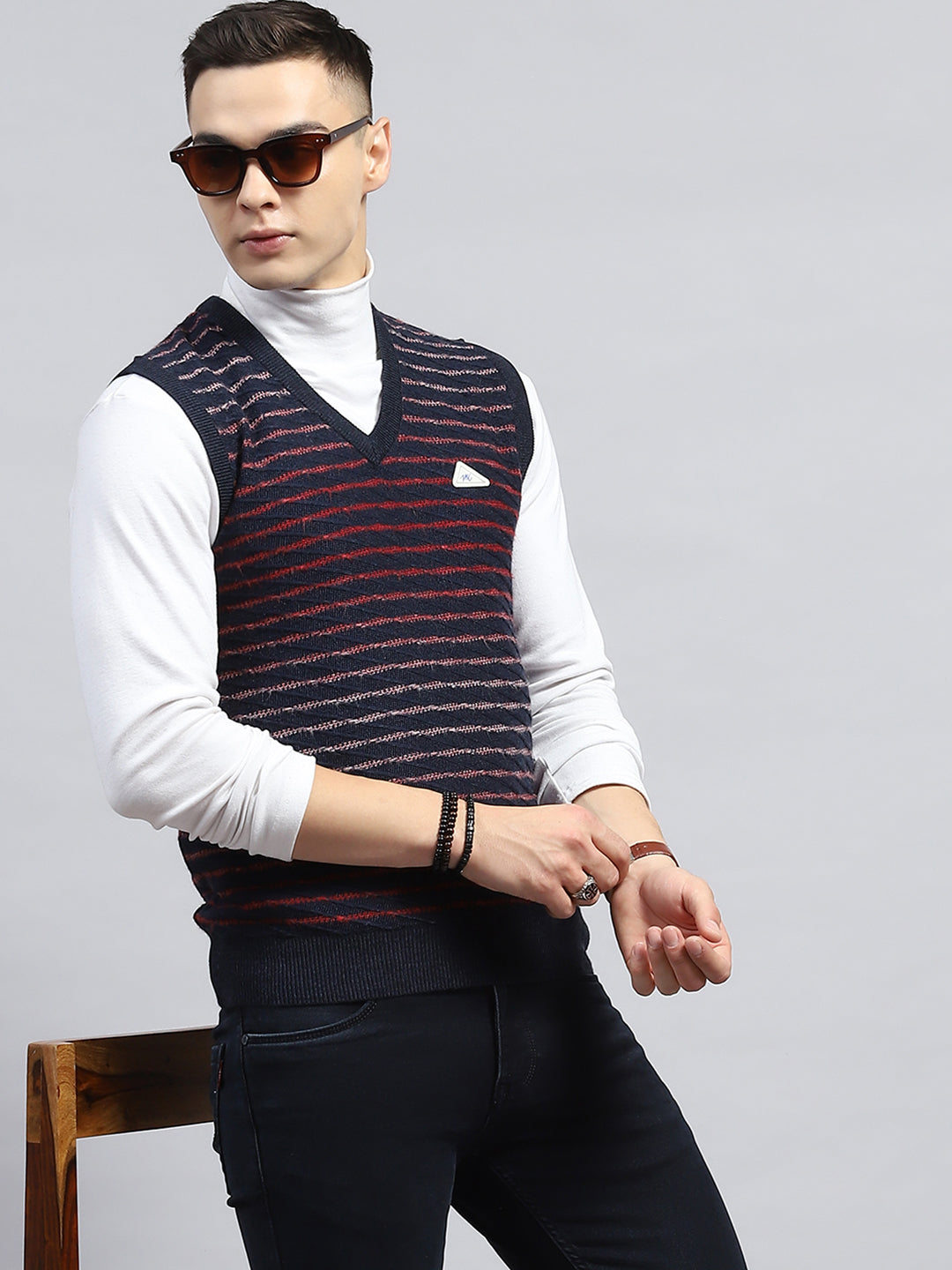 Men Navy Blue Self Design V Neck Sleeveless Sweater