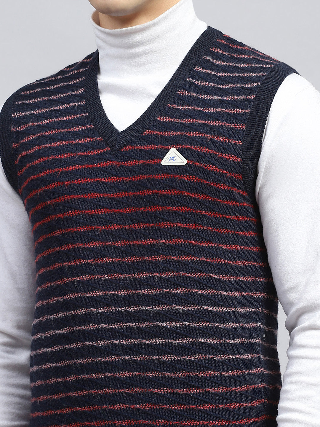 Men Navy Blue Self Design V Neck Sleeveless Sweater