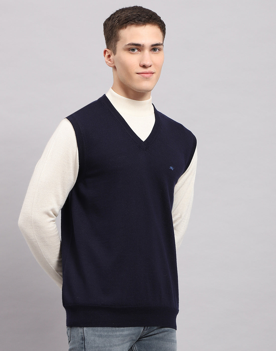 Men Navy Blue Solid V Neck Sleeveless Sweater