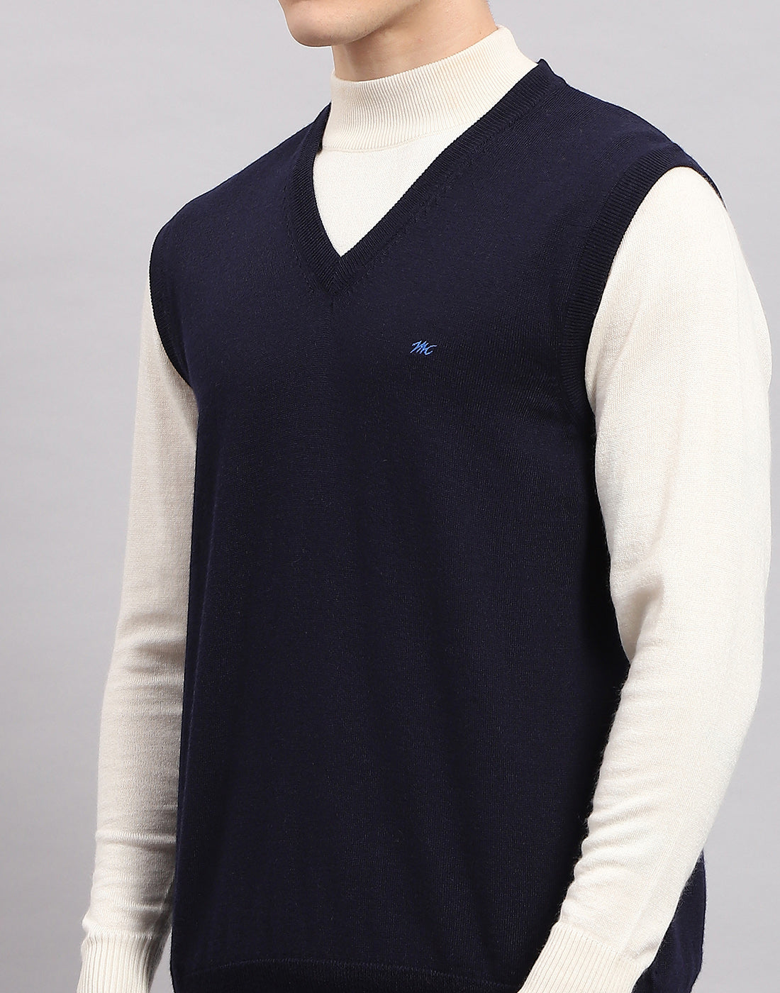 Men Navy Blue Solid V Neck Sleeveless Sweater