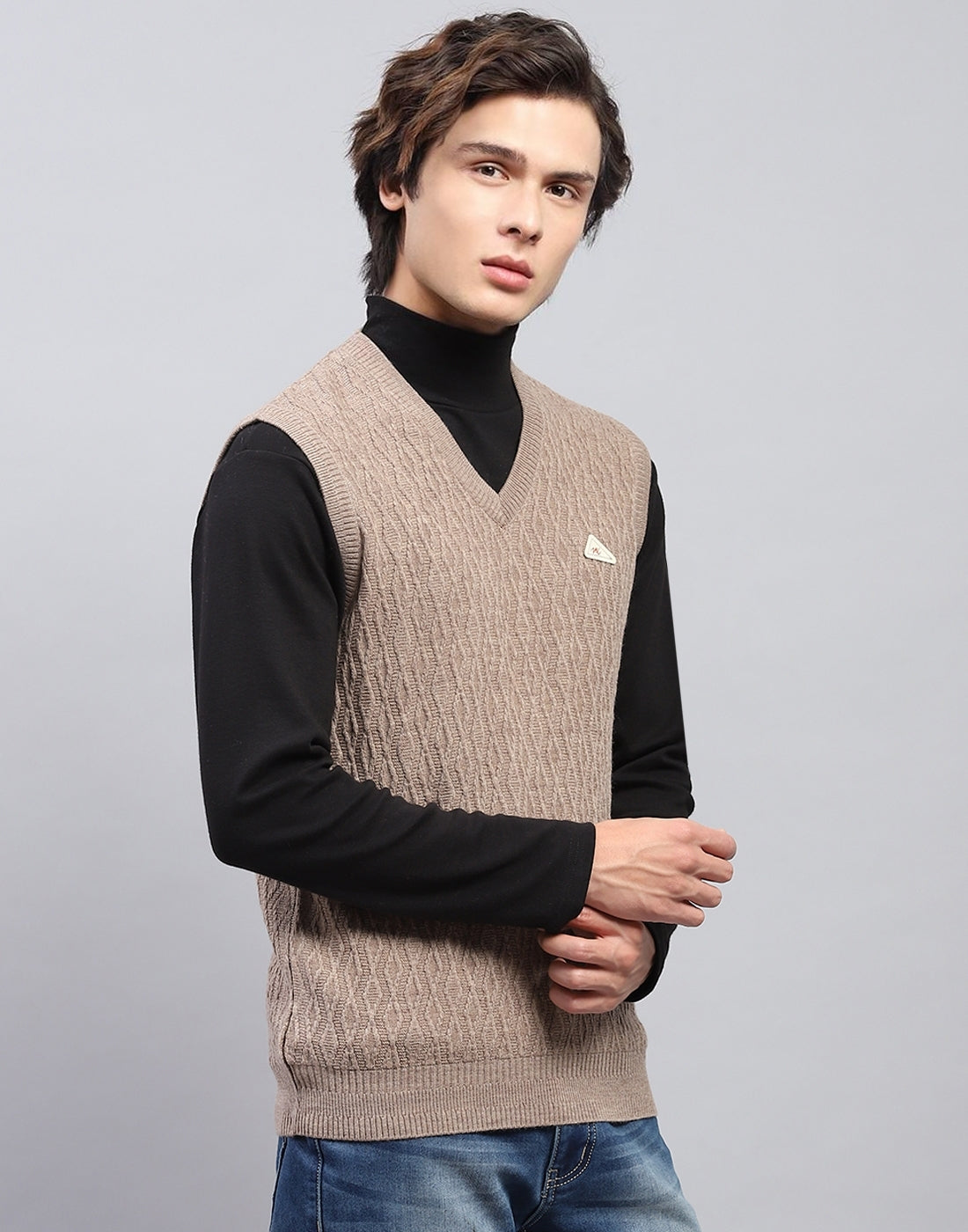 Men Beige Self Design V Neck Sleeveless Sweater