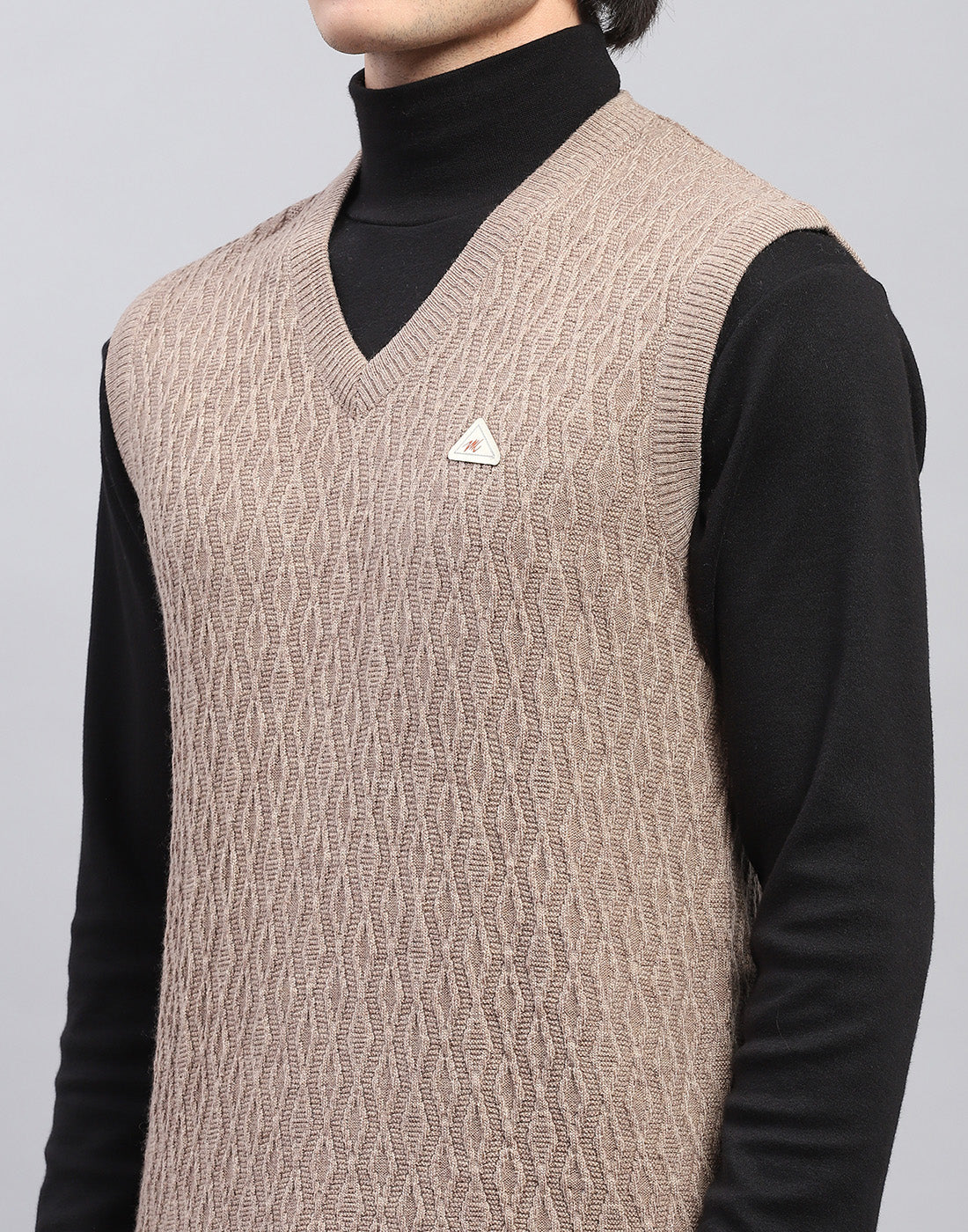 Men Beige Self Design V Neck Sleeveless Sweater