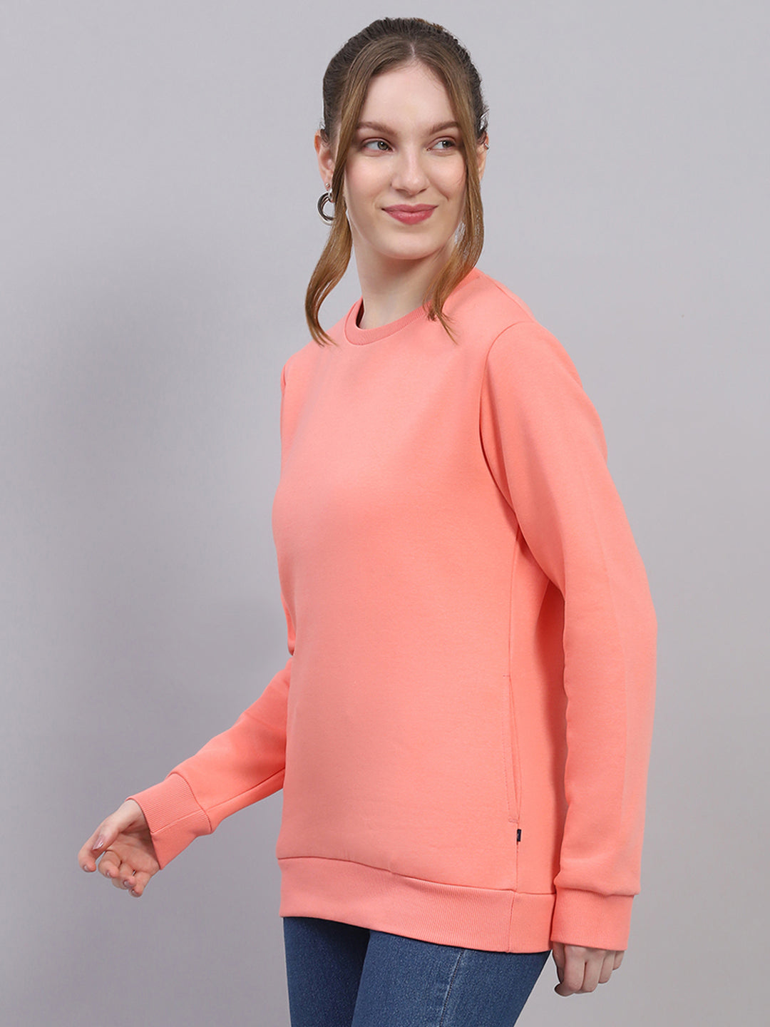 Women Peach Solid Round Neck Full Sleeve Sweatshirt