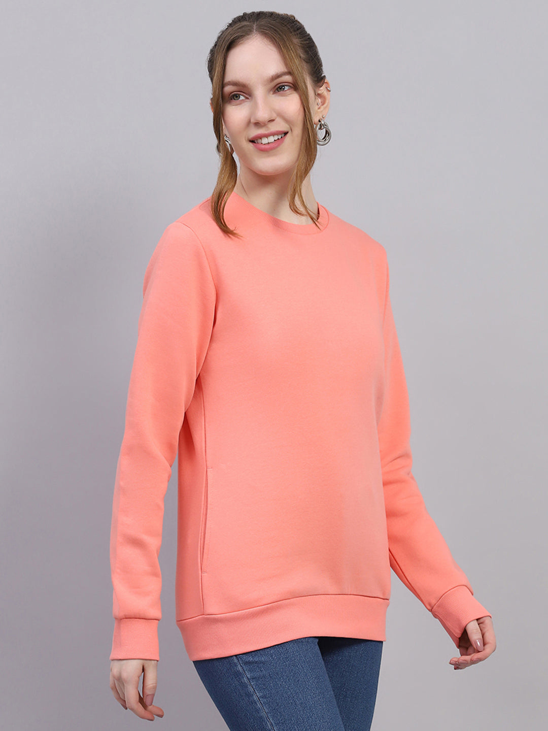 Women Peach Solid Round Neck Full Sleeve Sweatshirt