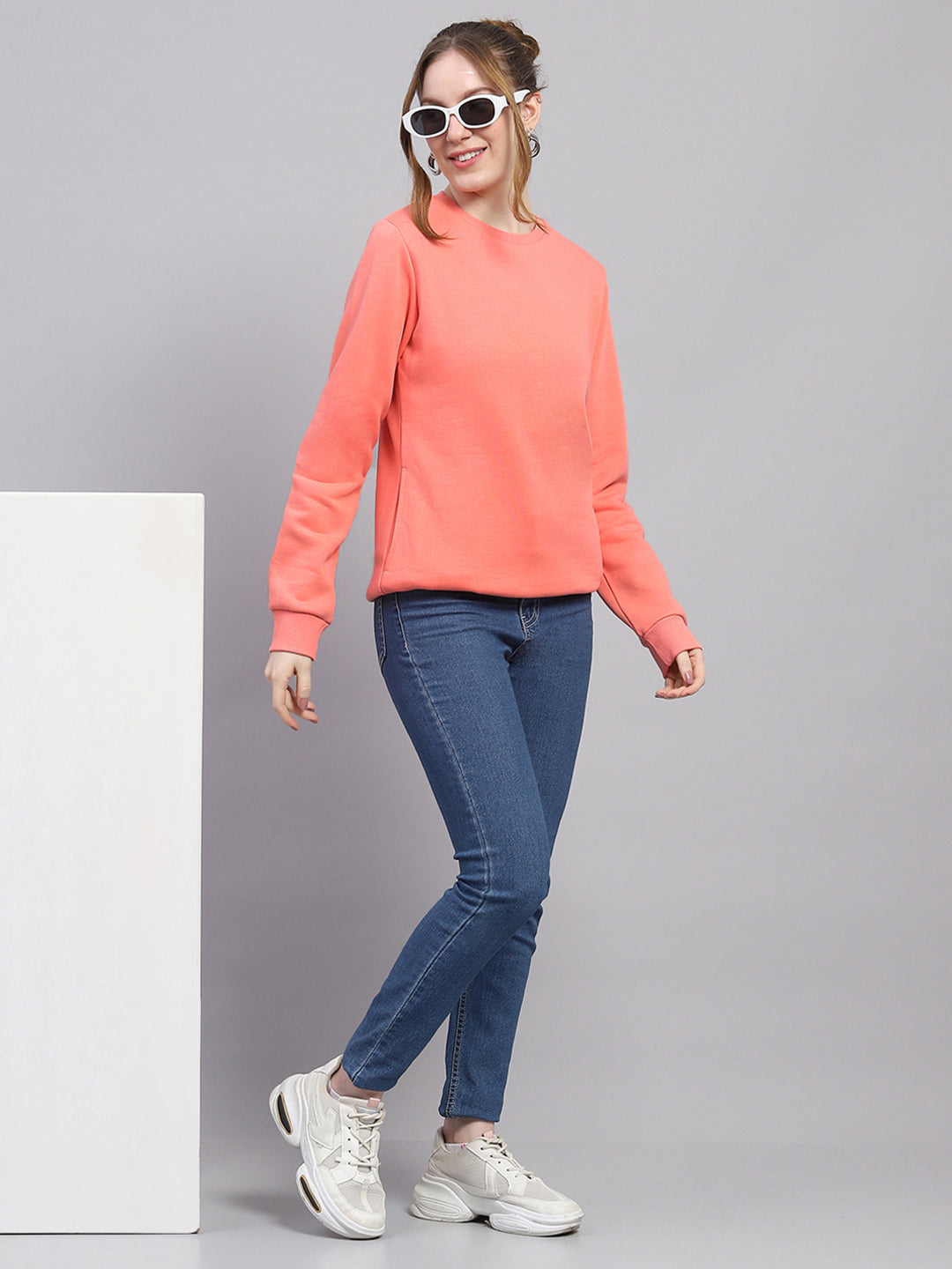 Women Peach Solid Round Neck Full Sleeve Sweatshirt