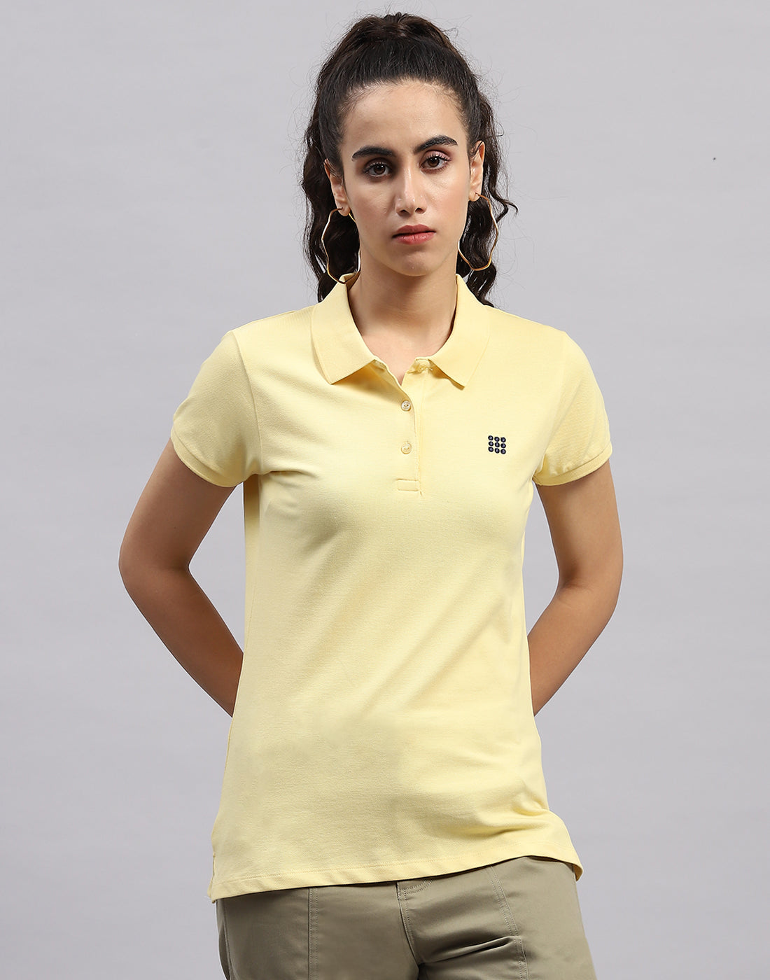 Women Yellow Solid Polo Collar Half Sleeve T Shirt