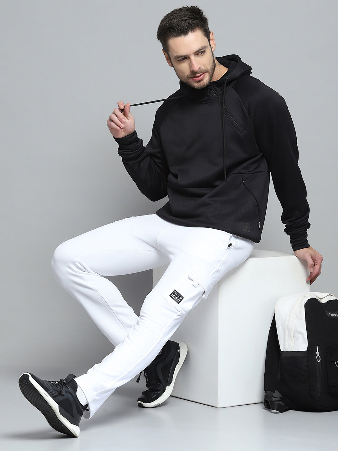 Men Black Solid Hooded Full Sleeve Sweatshirt