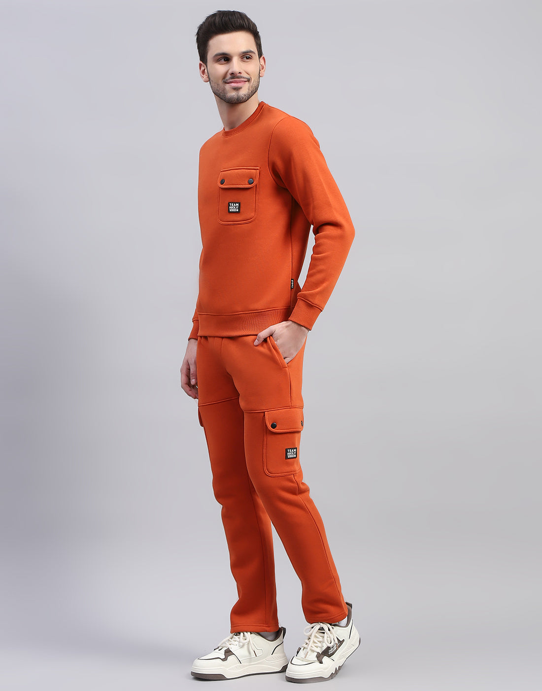 Men Orange Solid Round Neck Full Sleeve Tracksuit