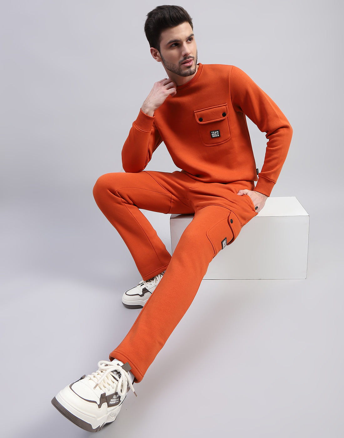 Men Orange Solid Round Neck Full Sleeve Tracksuit