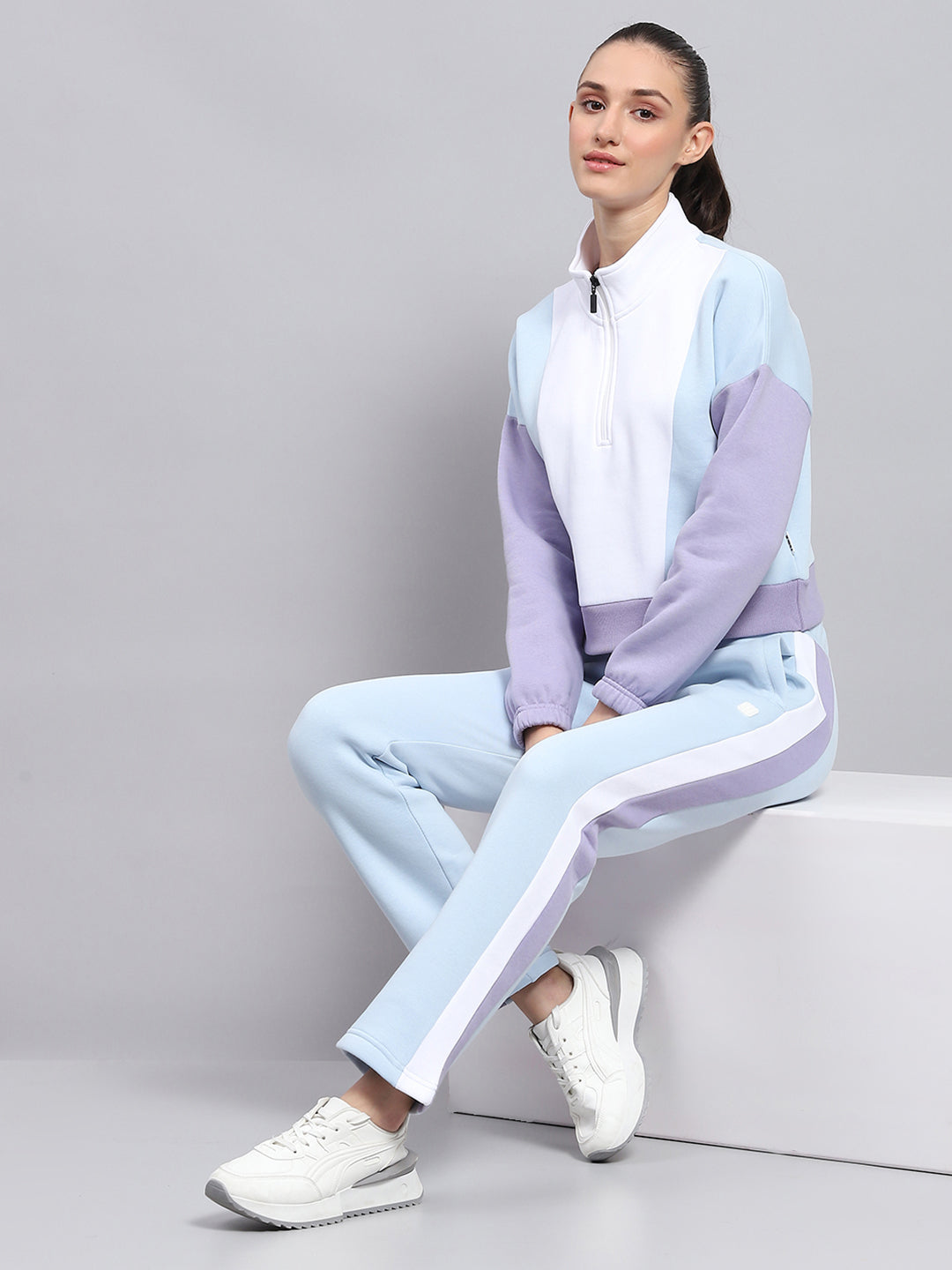 Women Blue Solid Mock Neck Full Sleeve Tracksuit