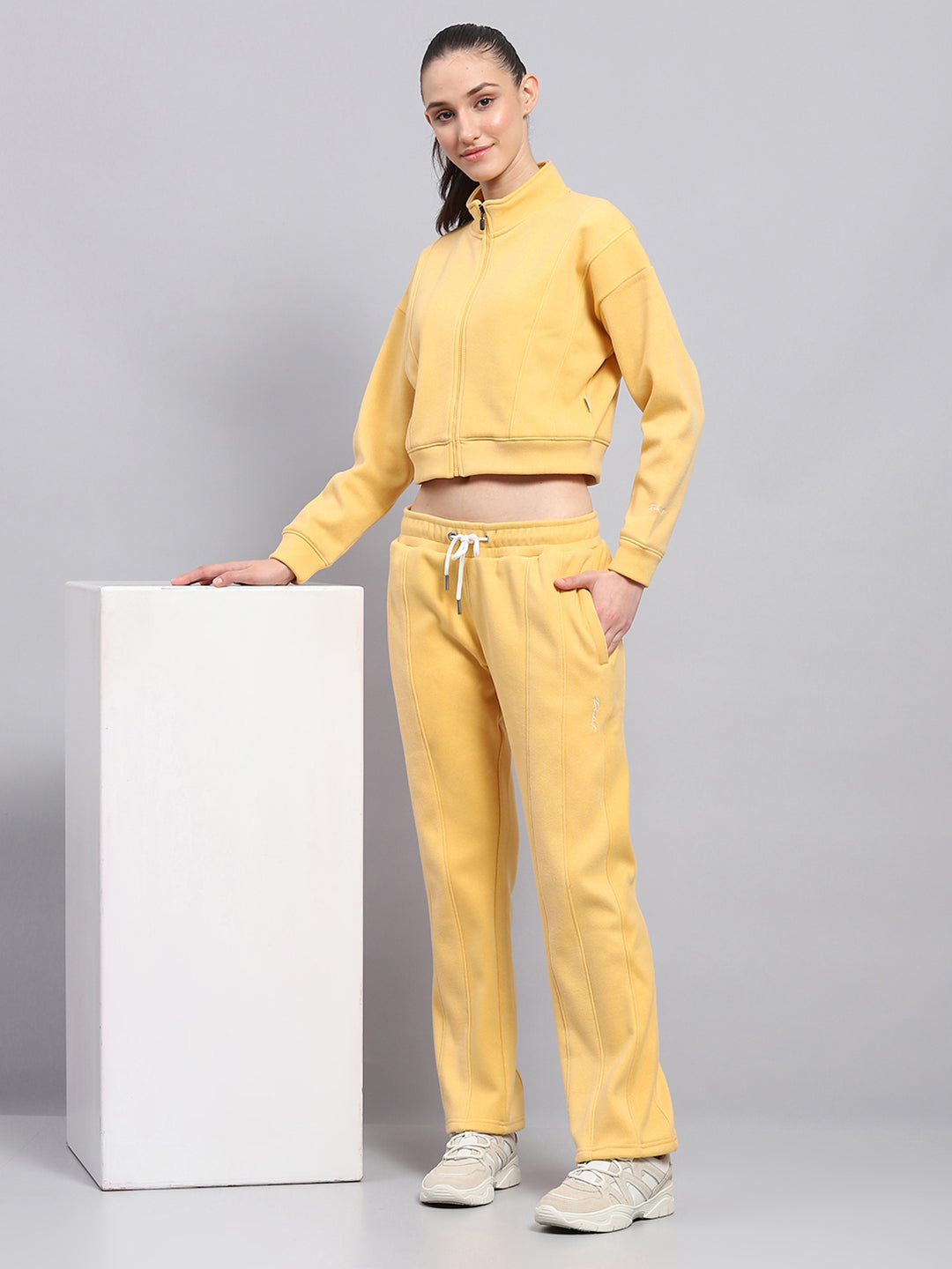 Women Yellow Solid Mock Neck Full Sleeve Tracksuit