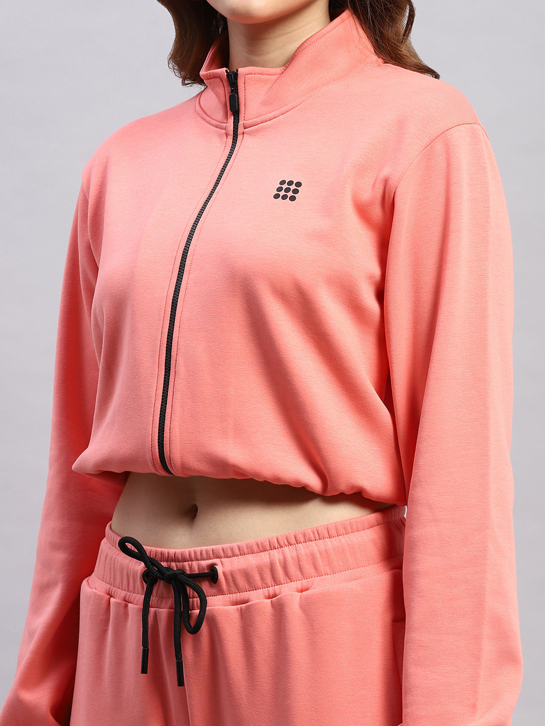 Women Pink Solid Mock Neck Full Sleeve Tracksuit