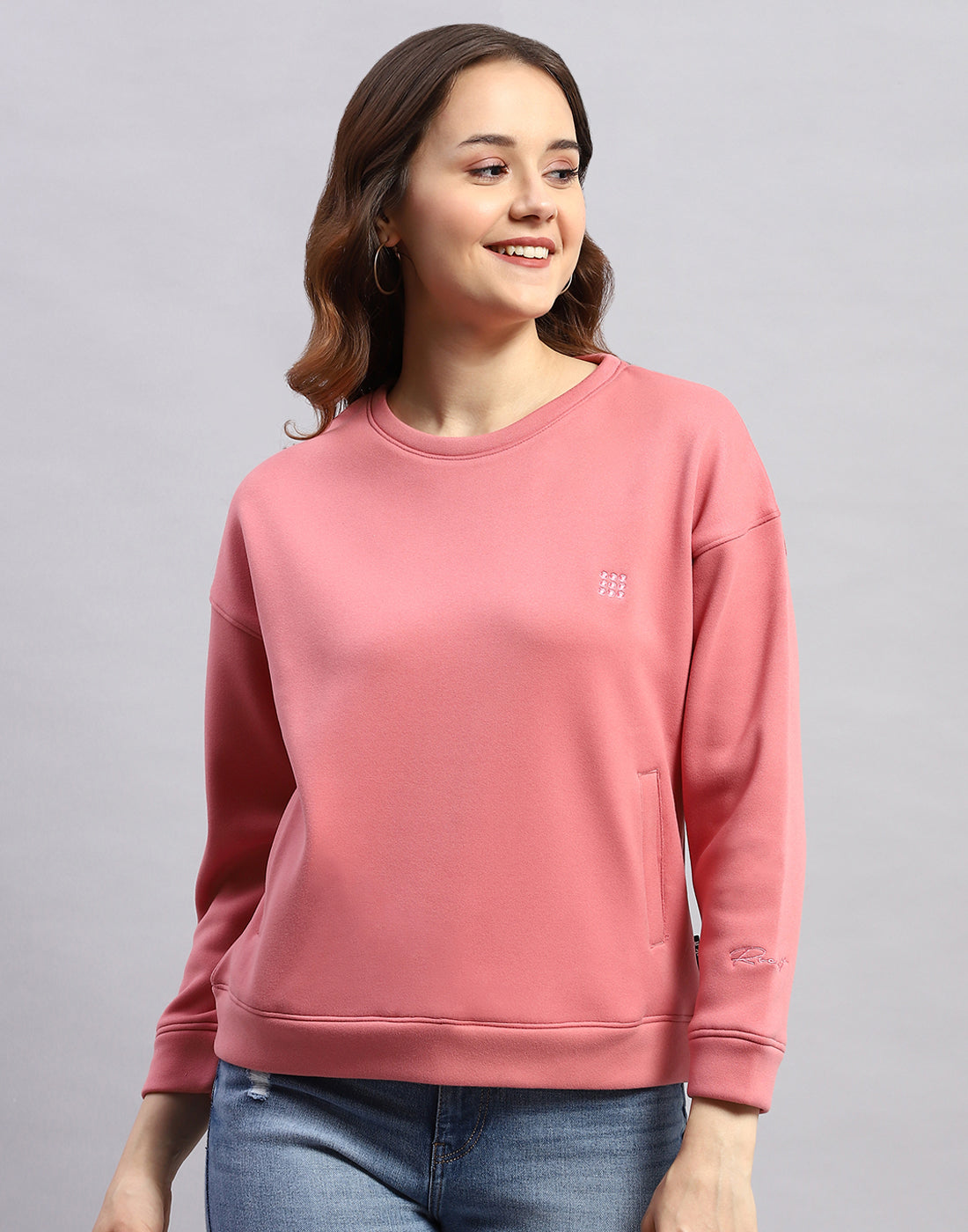 Women Pink Solid Round Neck Full Sleeve Sweatshirt