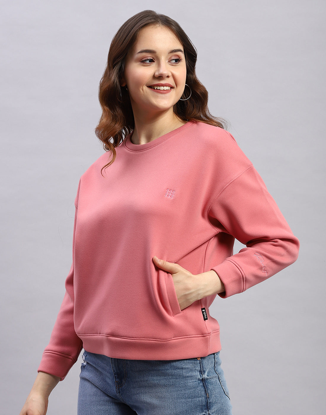 Women Pink Solid Round Neck Full Sleeve Sweatshirt