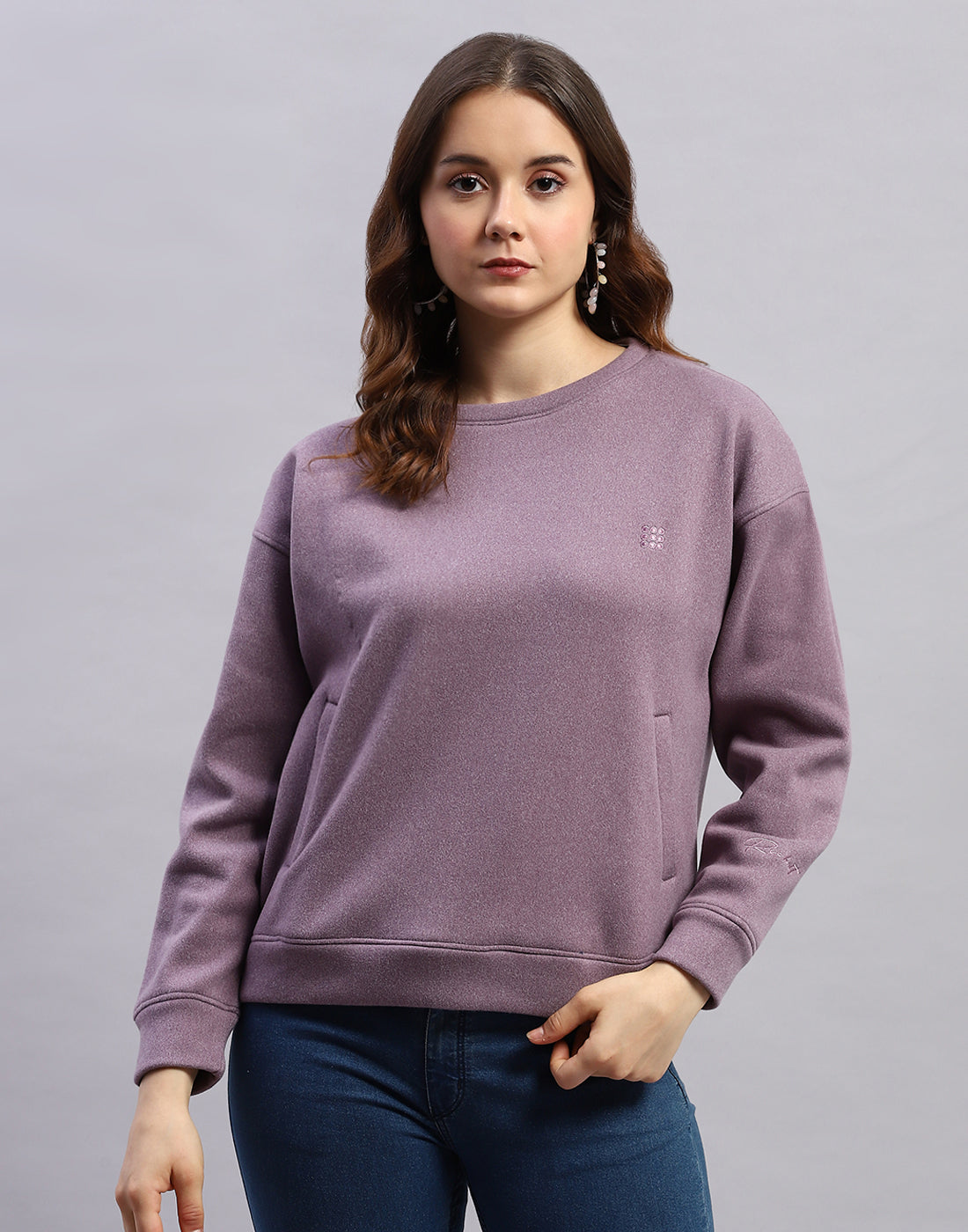 Women Purple Solid Round Neck Full Sleeve Sweatshirt