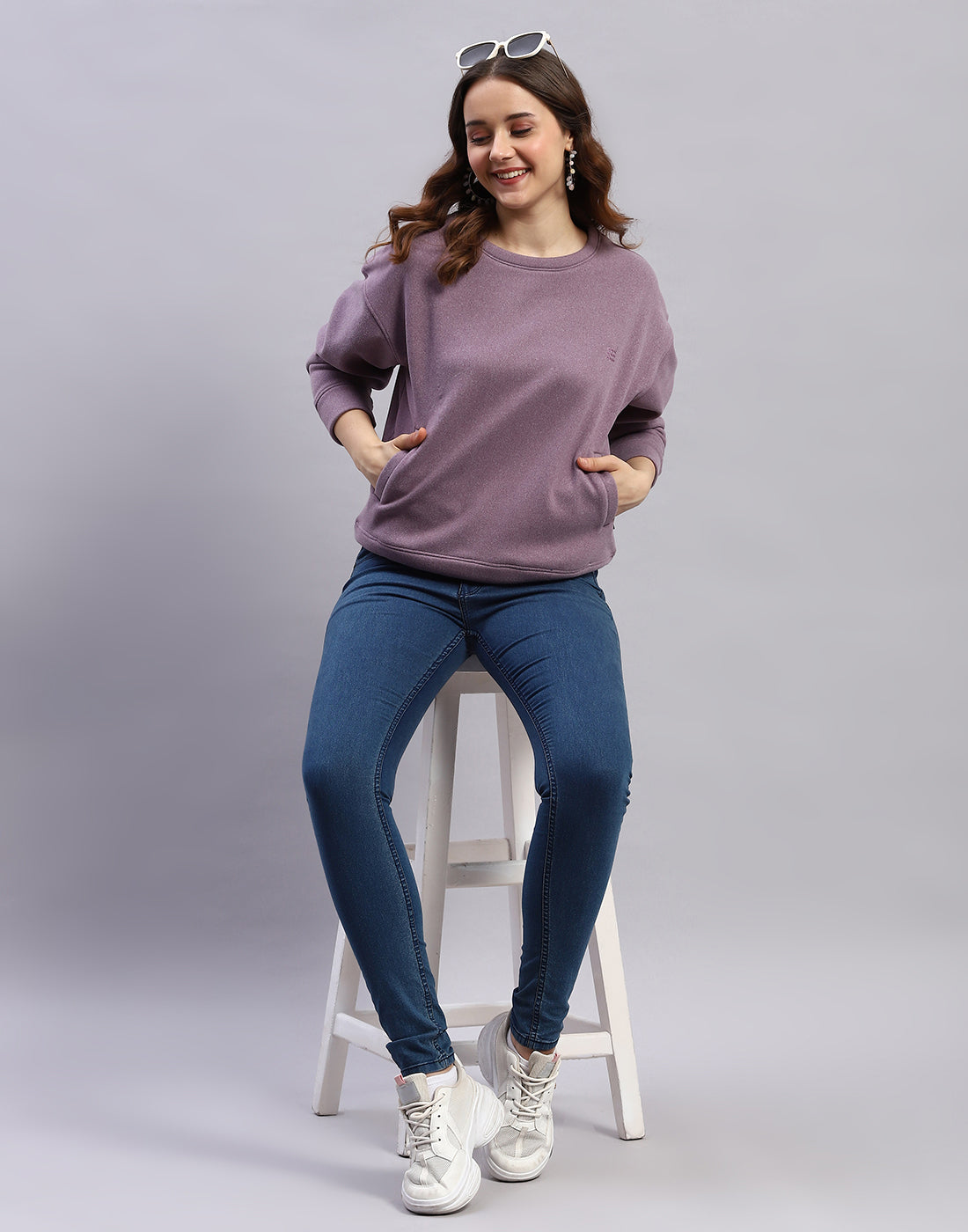 Women Purple Solid Round Neck Full Sleeve Sweatshirt