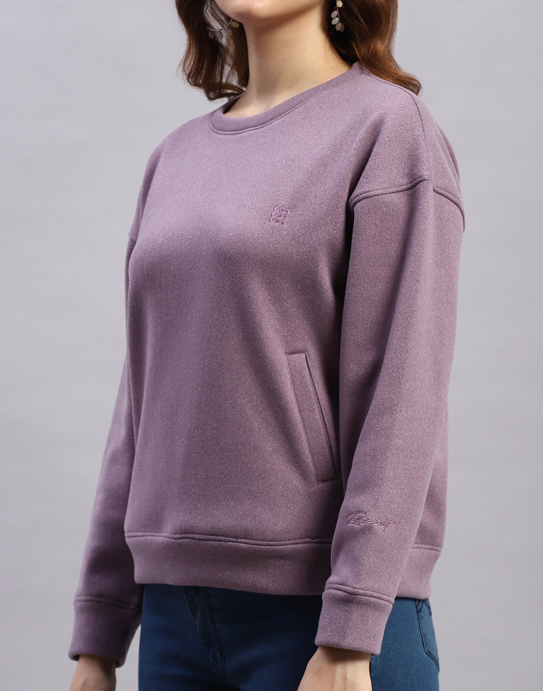 Women Purple Solid Round Neck Full Sleeve Sweatshirt