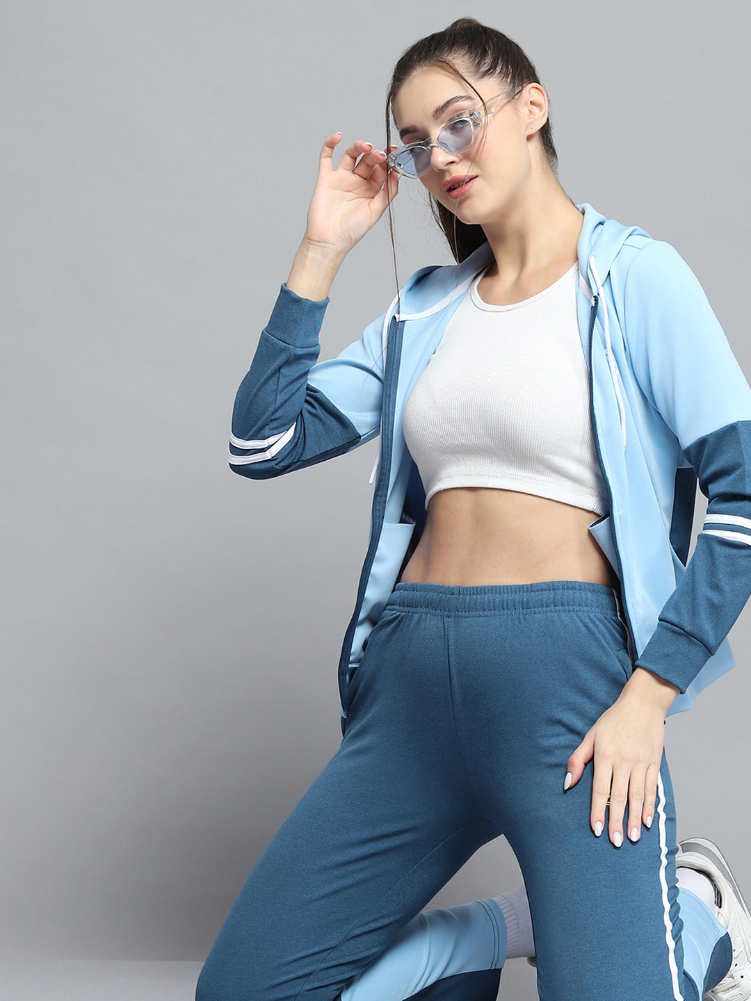 Women Blue Solid Hooded Full Sleeve Tracksuit