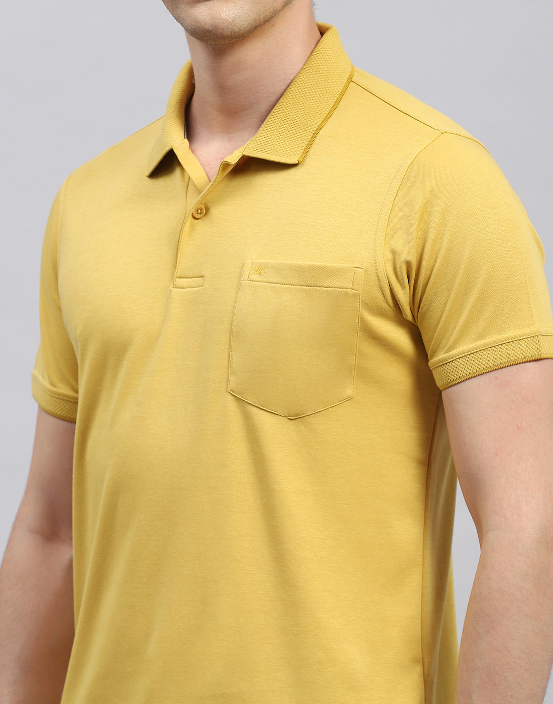 Men Yellow Solid Polo Collar Half Sleeve T-Shirt