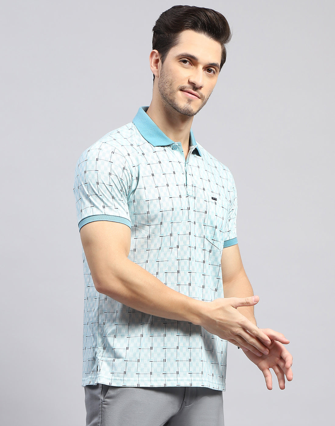 Men Sky Blue Self Design Polo Collar Half Sleeve T-Shirt