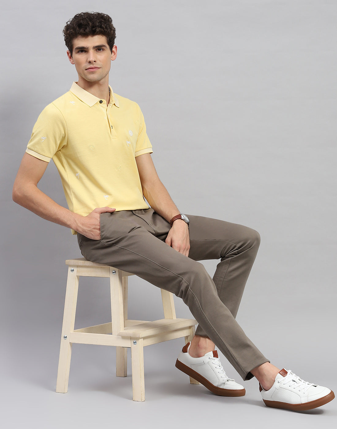 Men Yellow Solid Polo Collar Half Sleeve T-Shirt