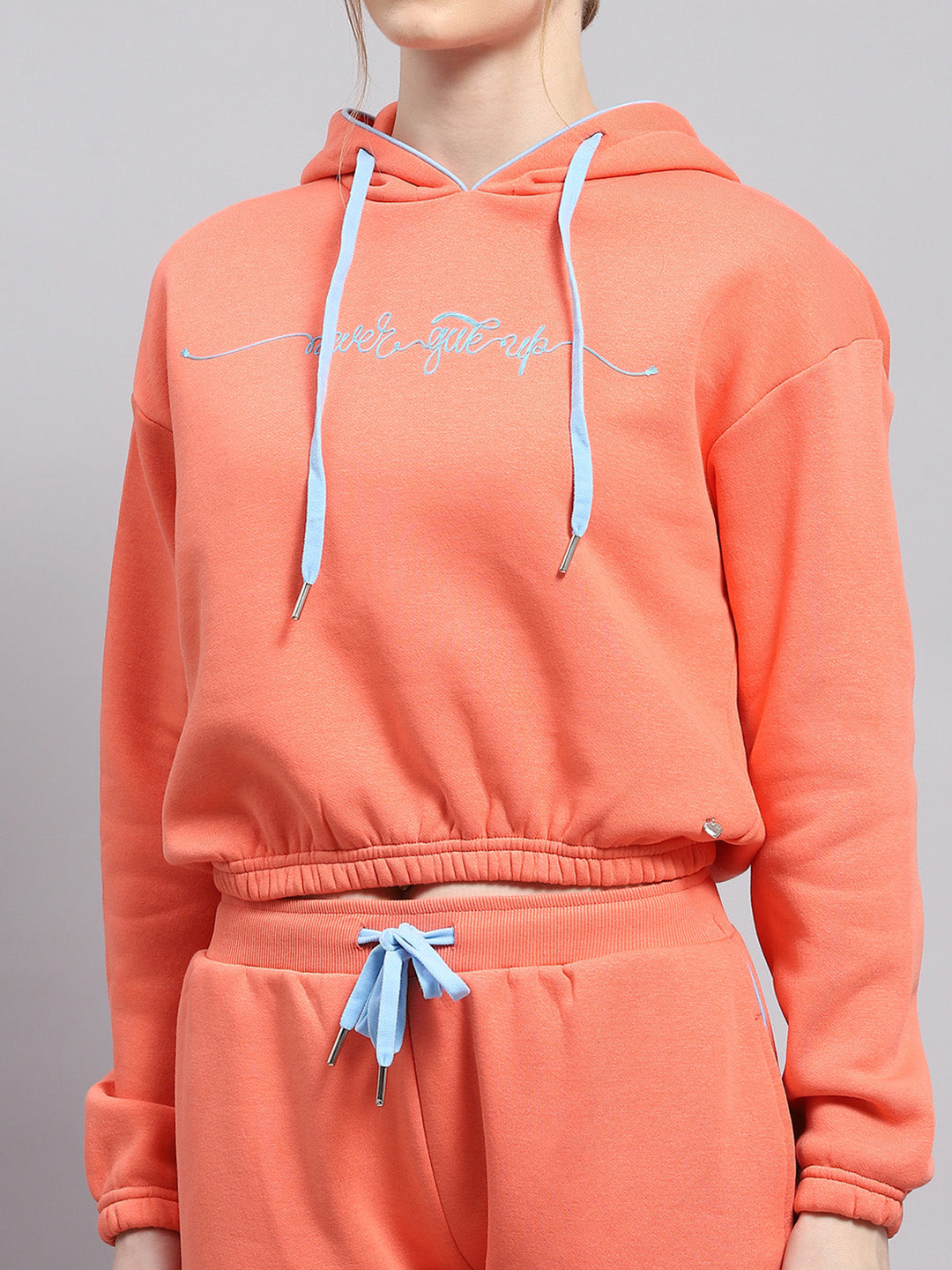 Women Peach Printed Hooded Full Sleeve Tracksuit