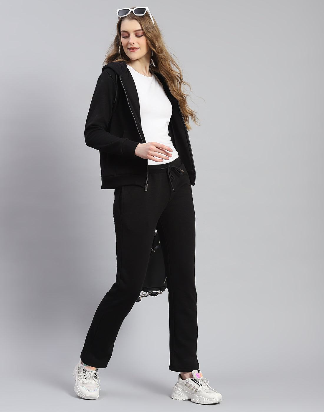 Women Black Solid Hooded Full Sleeve Tracksuit