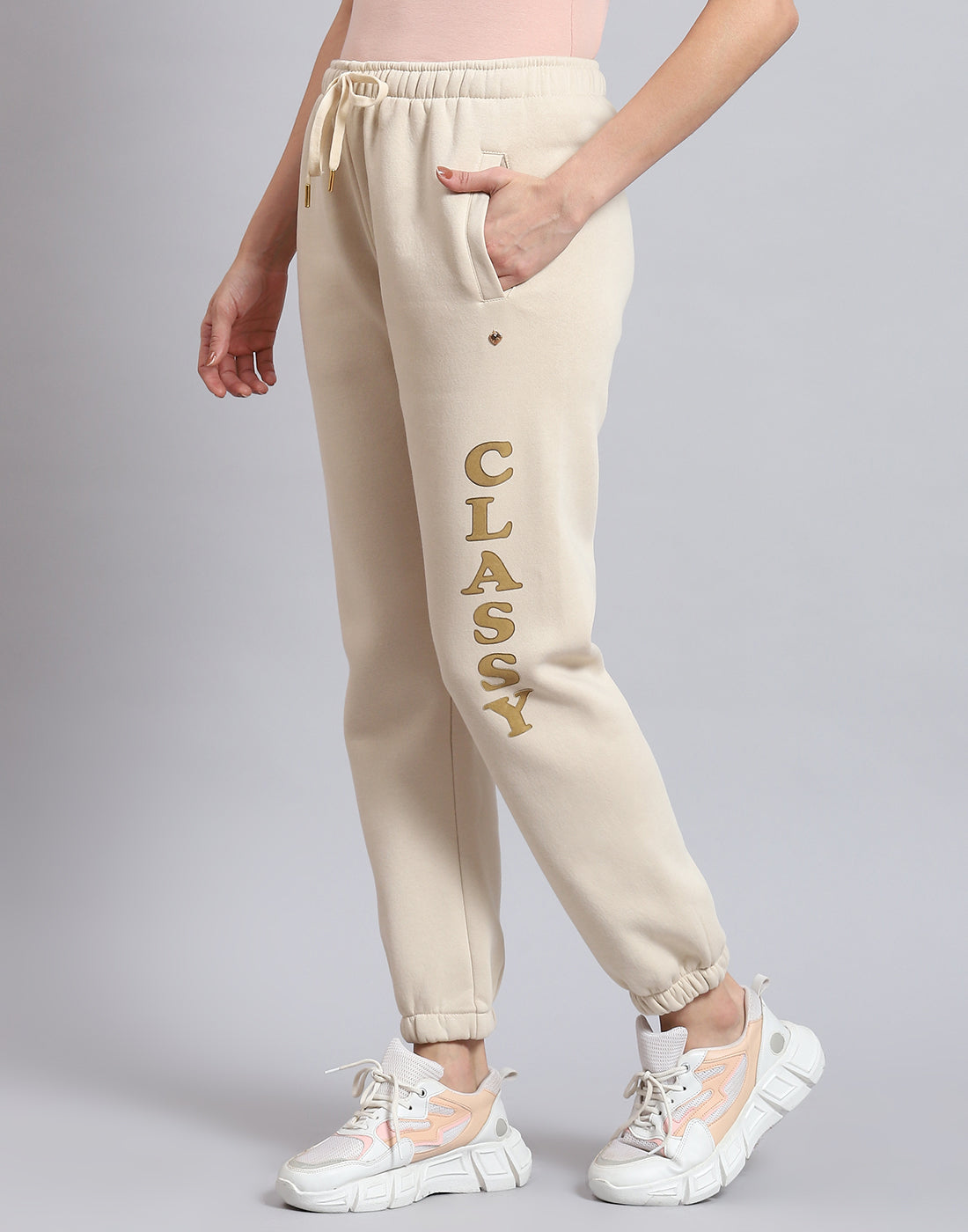 Women Beige Printed Regular Fit Winter Lower