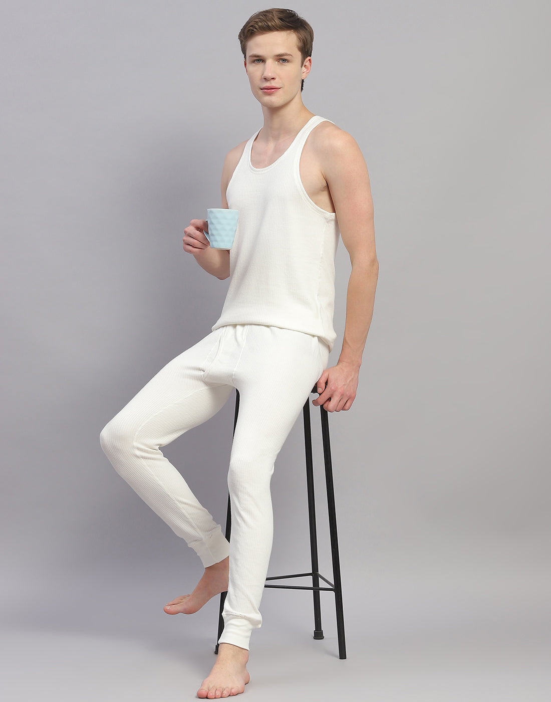 Men Off White Solid Round Neck Sleeveless Thermal Vest