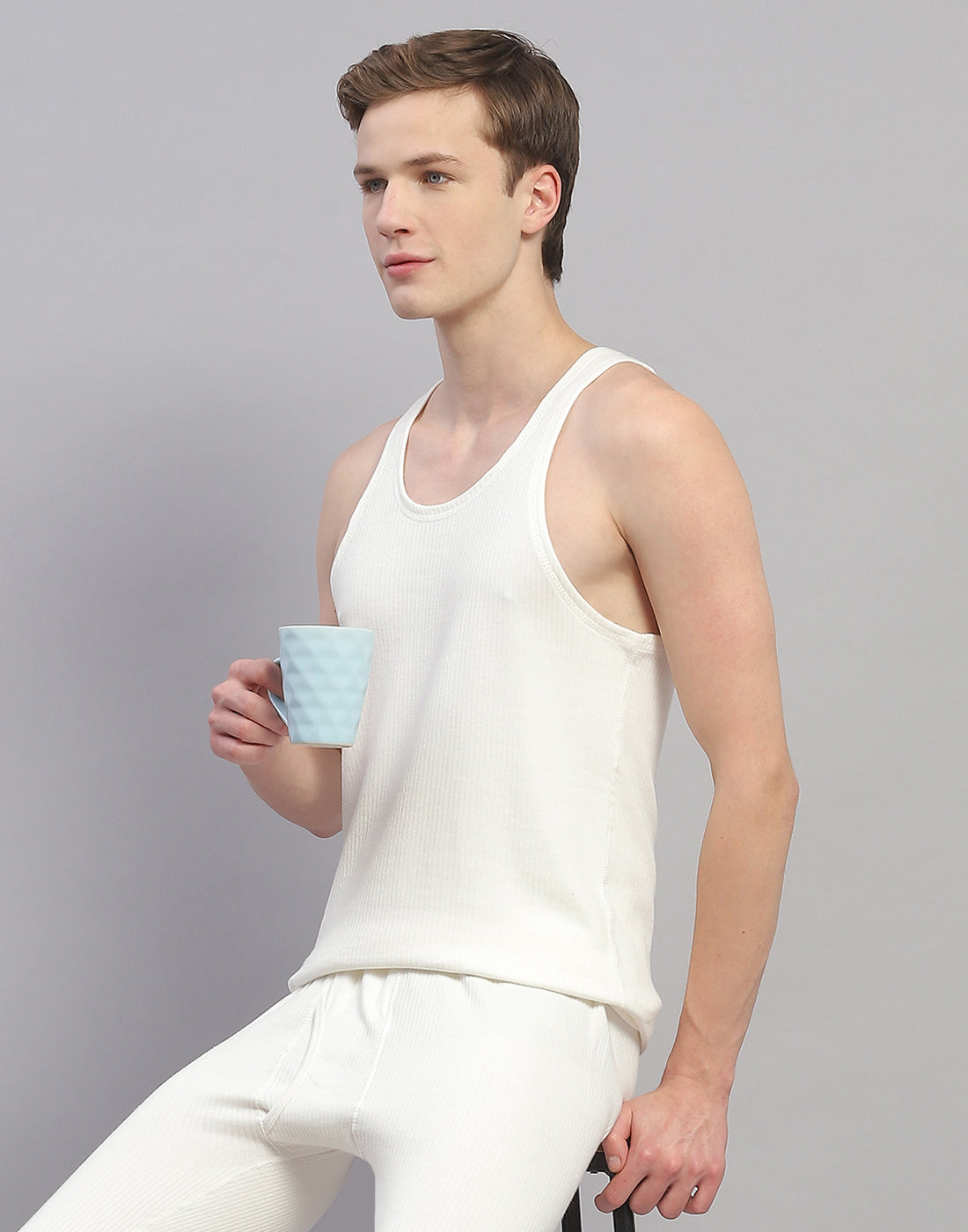 Men Off White Solid Round Neck Sleeveless Thermal Vest